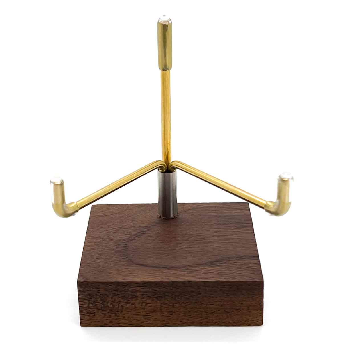 Front view of walnut prong-style display stand