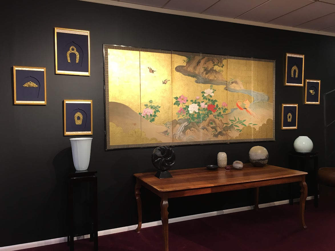 A Japanese Folding Screen Mounted on a Black Wall