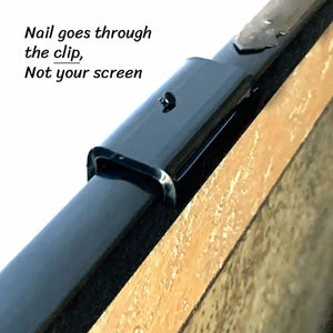 Close-up view of nail through clip